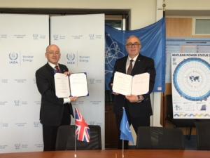 A photograph showing David Hall, UK Permanent Representative to the IAEA, (left) and Mikhail Chudakov, IAEA Deputy Director General and Head of the Department of Nuclear Energy, at the signing ceremony to formalise the new Collaborating Centre