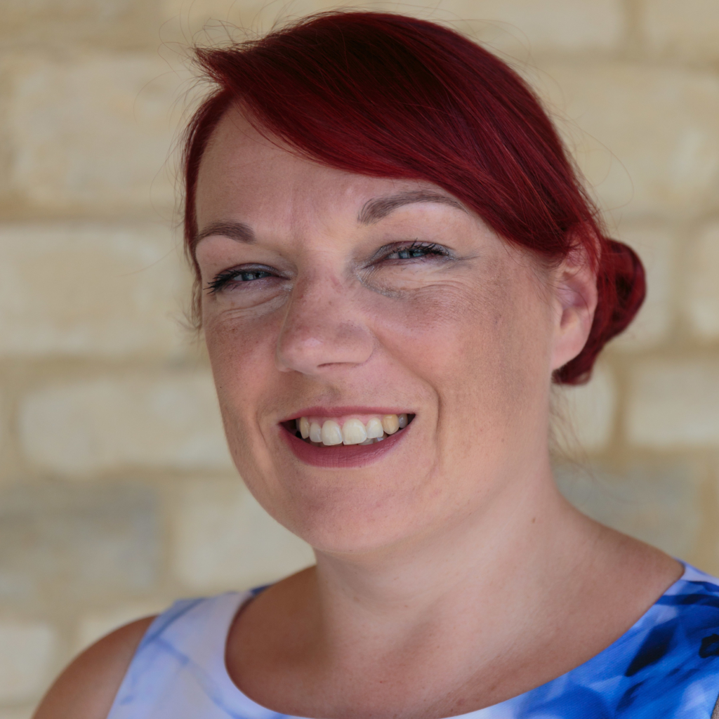 Photograph of Melissa Loyley smiling and looking into the camera